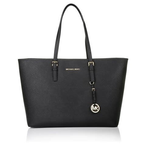 michael kors jet set travel md tz multifunction tote black|michael kors bag with airplanes.